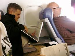 Laptop crammed in a plane